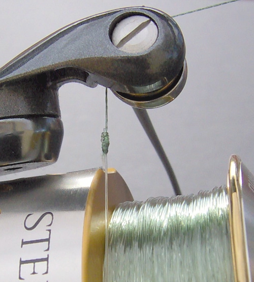 Premium Photo  Fishing line is skillfully spooled onto a spinning